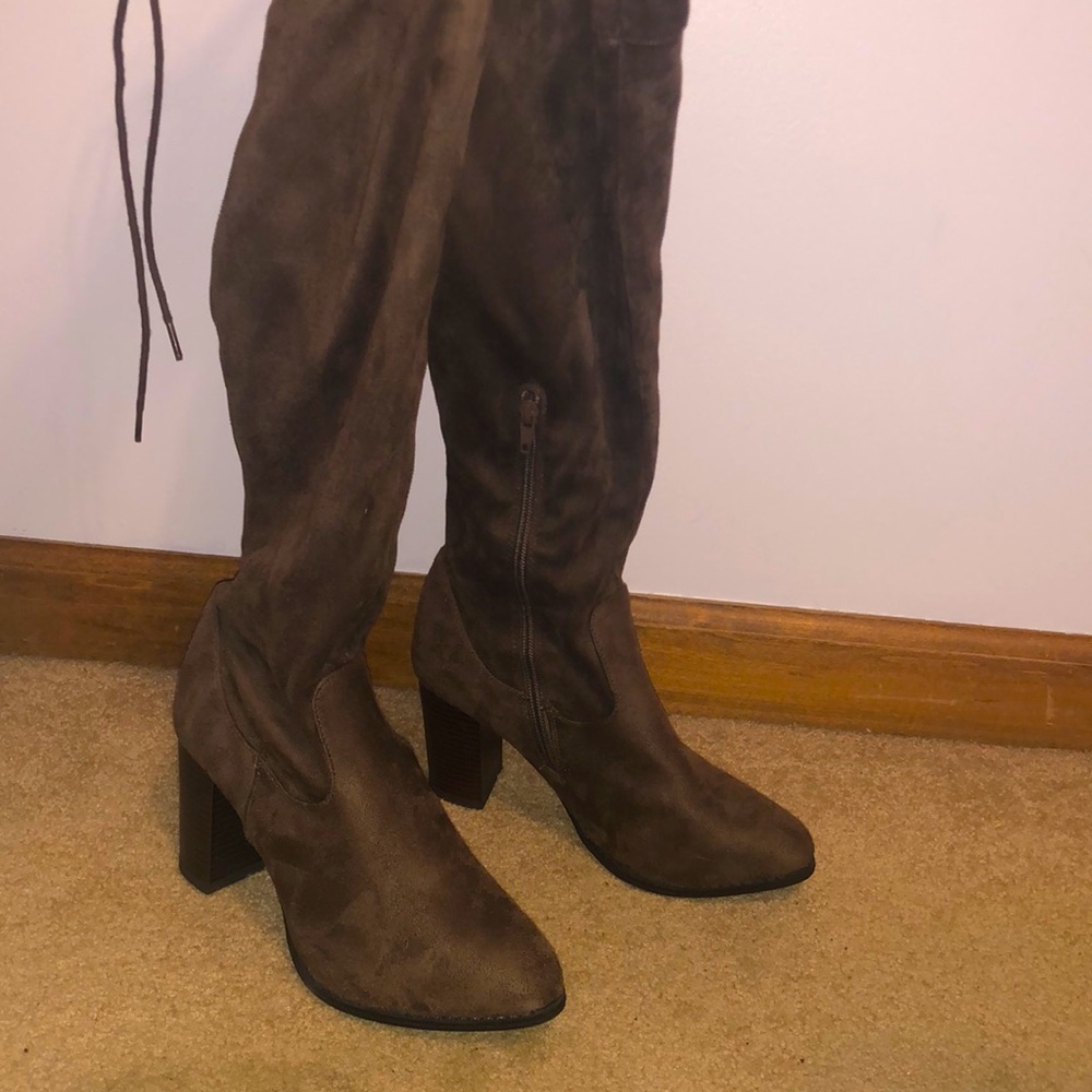 Knee high lace up brown heeled boots